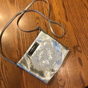 Small silver over the shoulder bag